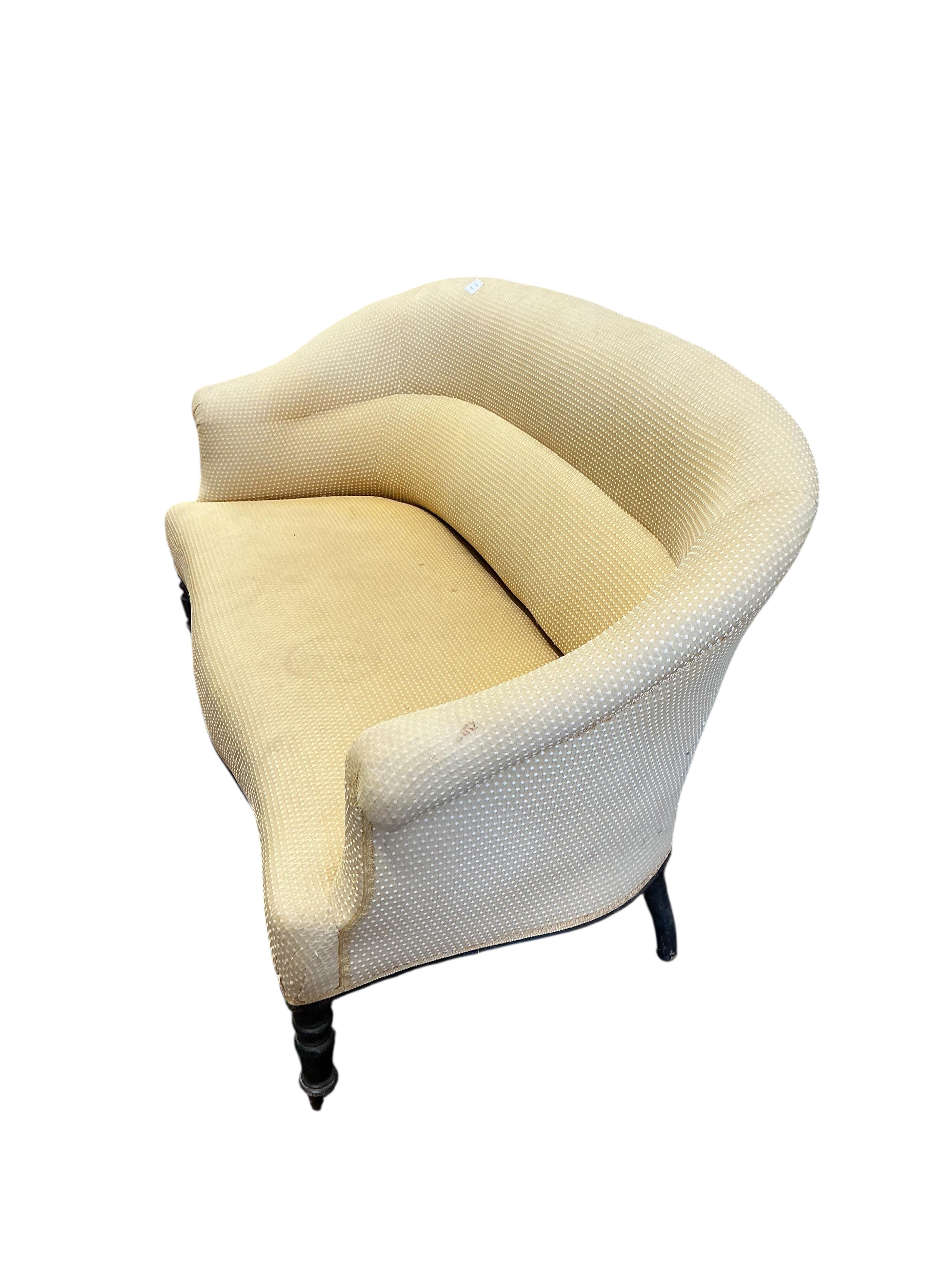 A late Victorian upholstered tub framed settee, width 150cm, depth 66cm, height 79cm